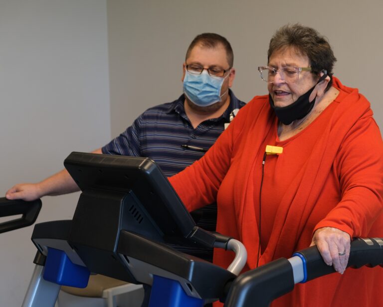 two residents working out on treadmills
