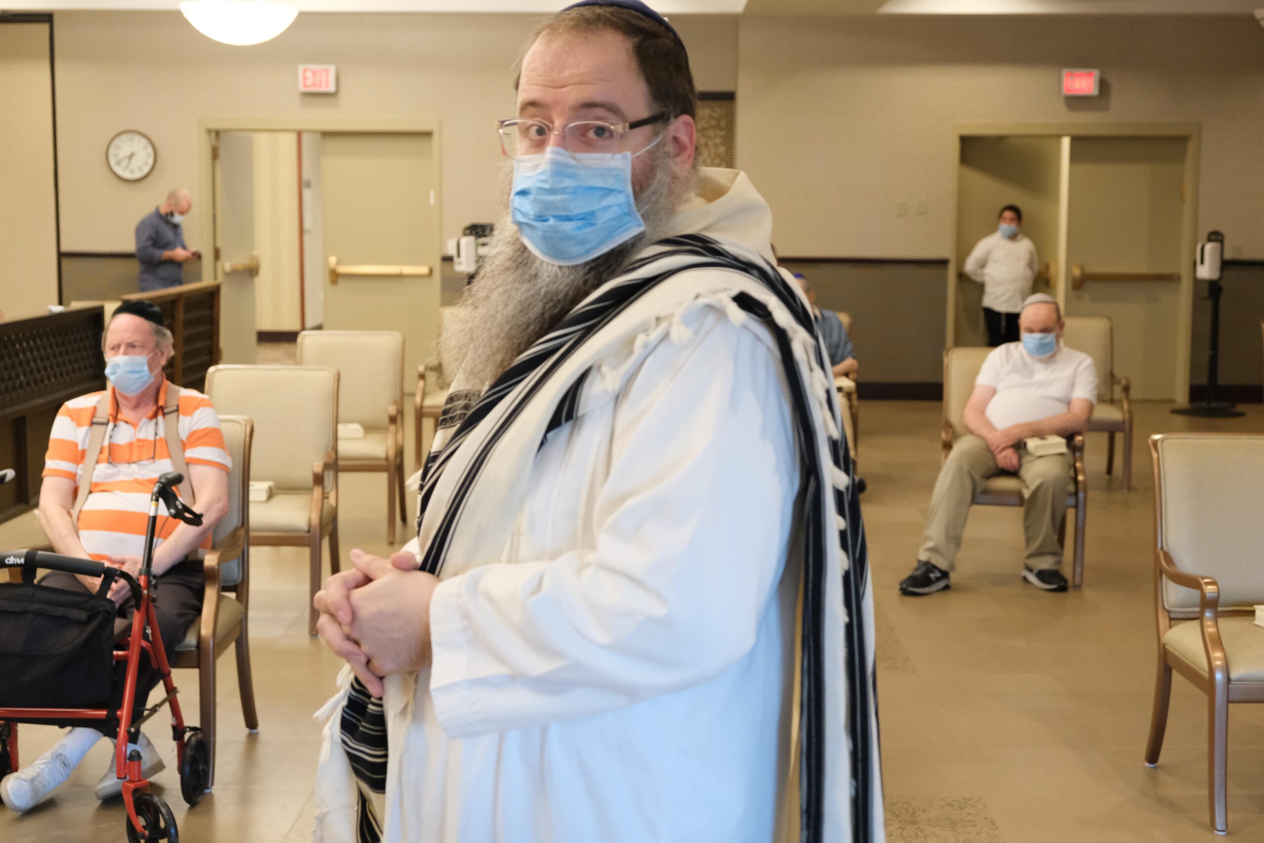 Rabbi standing in front of residents