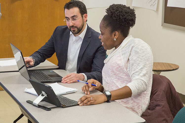 Dr. Christine Kovach Dr. Maurad Taani sharing research Dr. Christine Kovach Dr. Maurad Taani sharing research