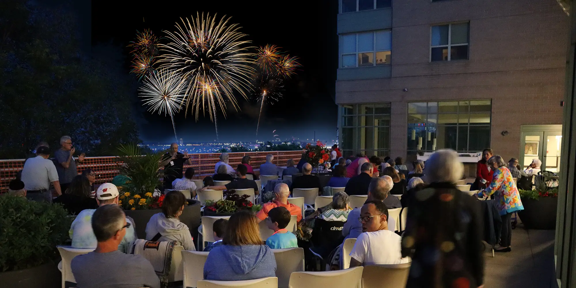 Residents and guests watching fireworks from Promenade