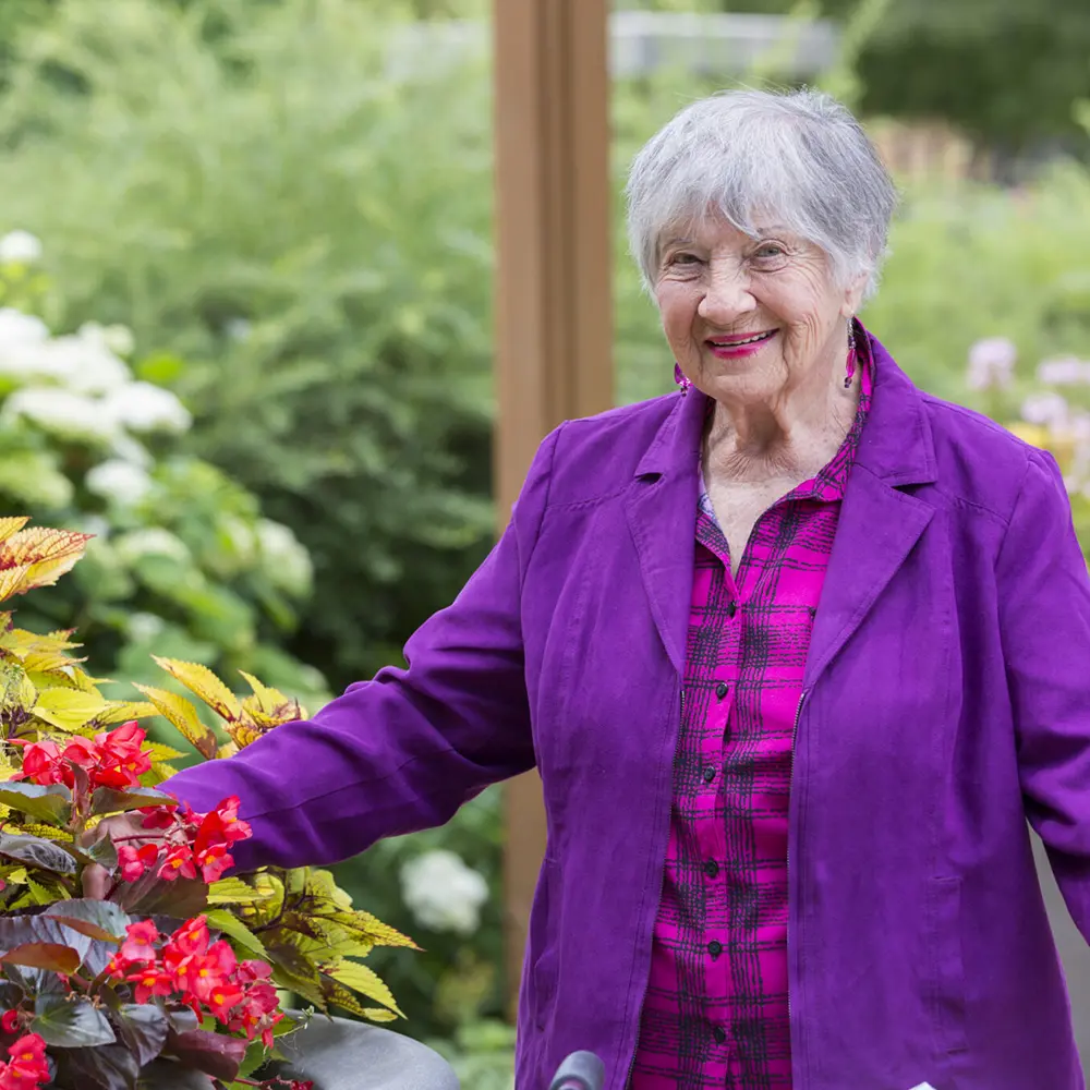 Woman in purple blazer in Ovation gardens